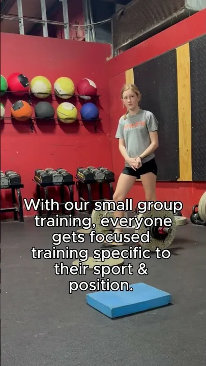 A young athlete training toward a measured milestone in the gym